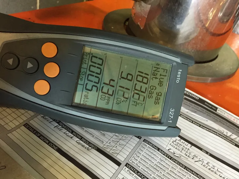 Combustion analyser reading during boiler servicing in Prescot